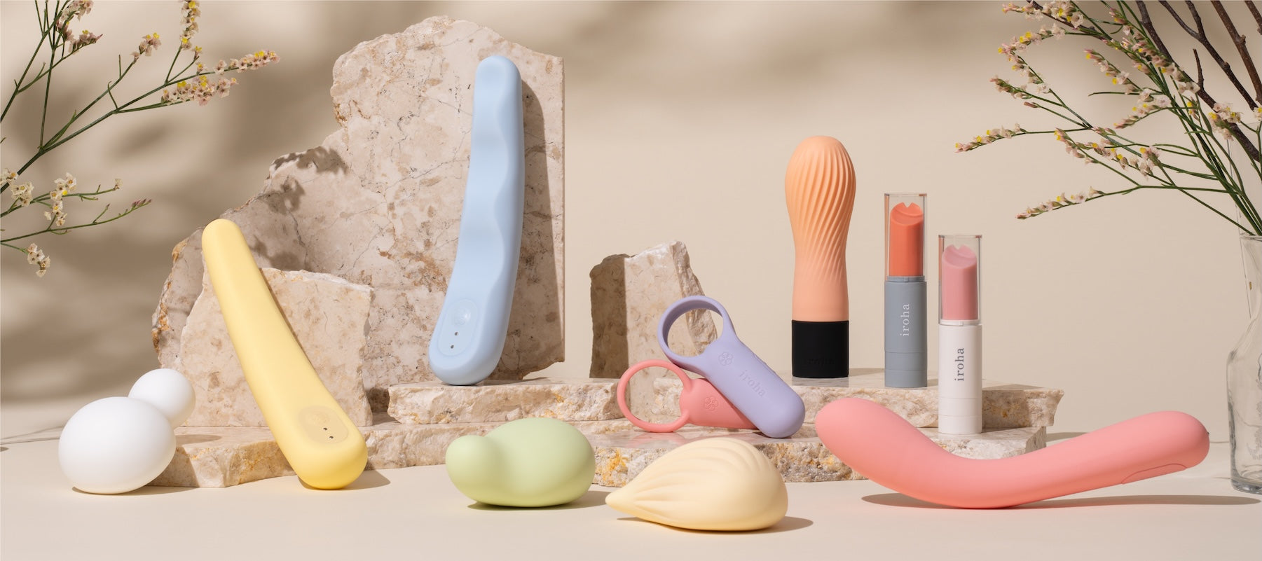 Colorful iroha pleasure items on a neutral background