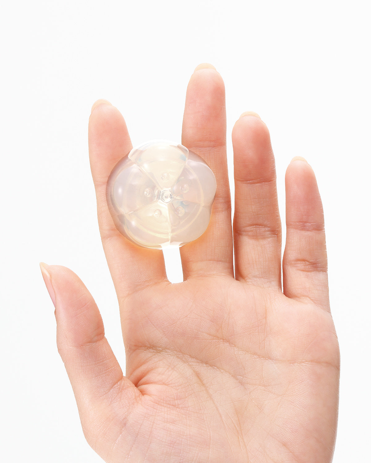 holding iroha petit between fingers